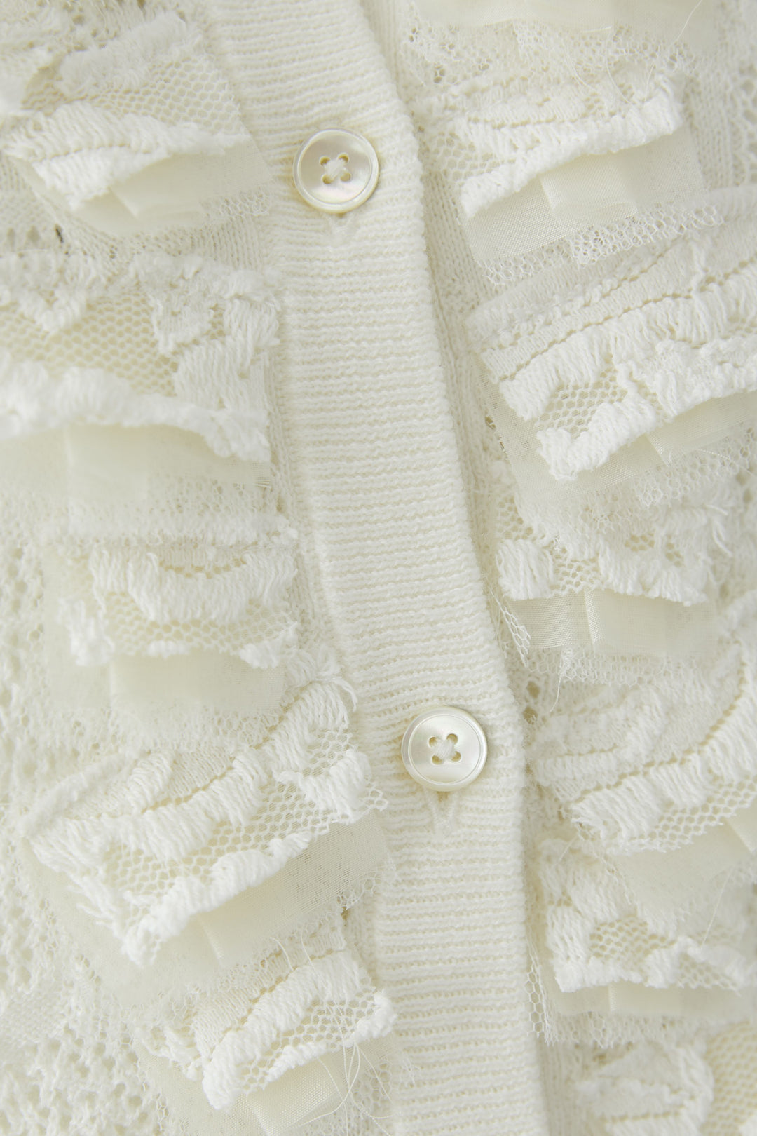 Cardigan en maille à volants délicats