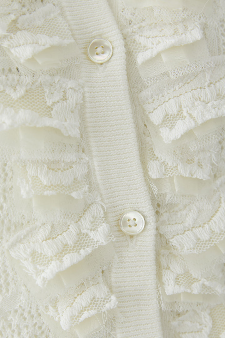 Cardigan en maille à volants délicats