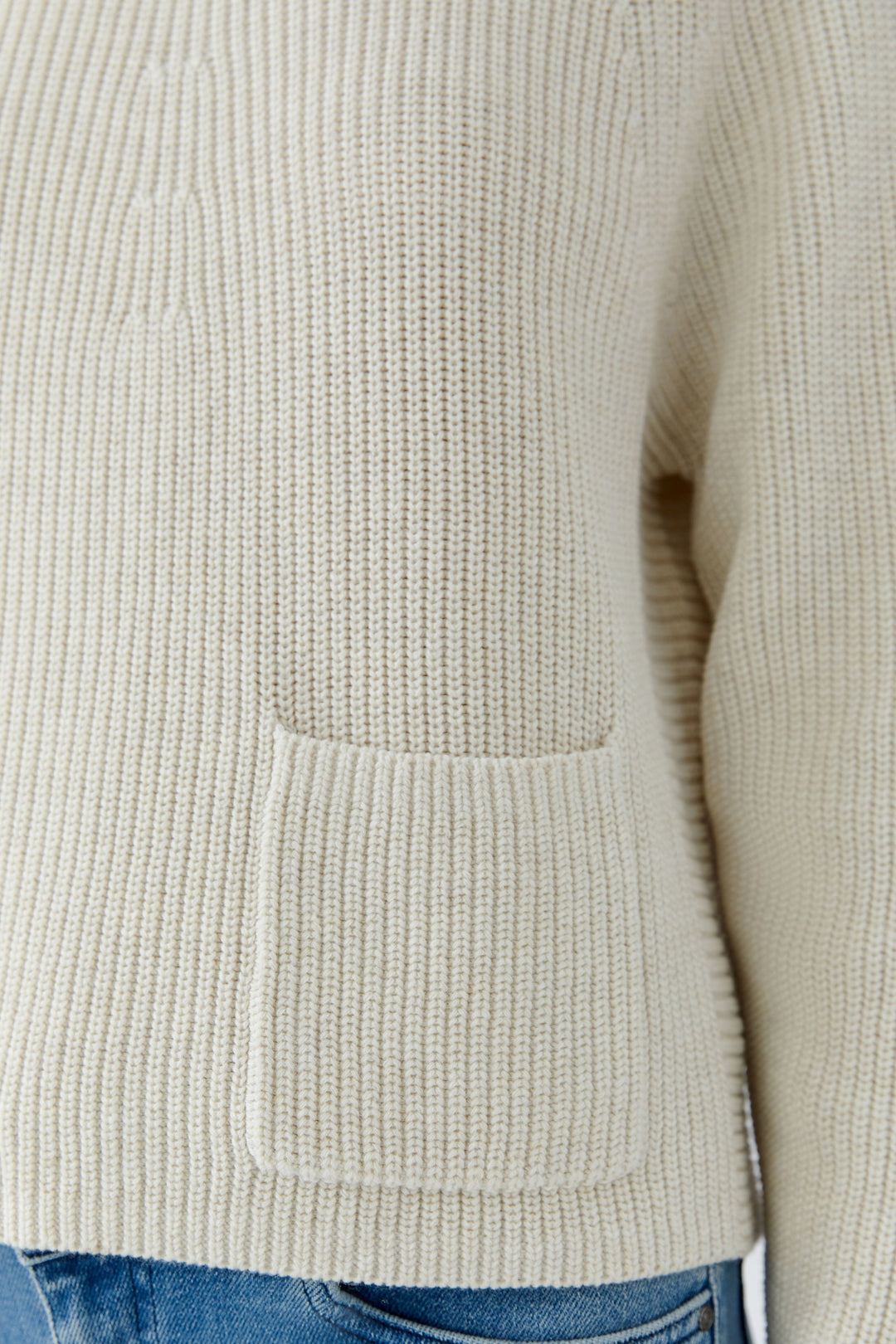 Pull texturé à poche plaquée