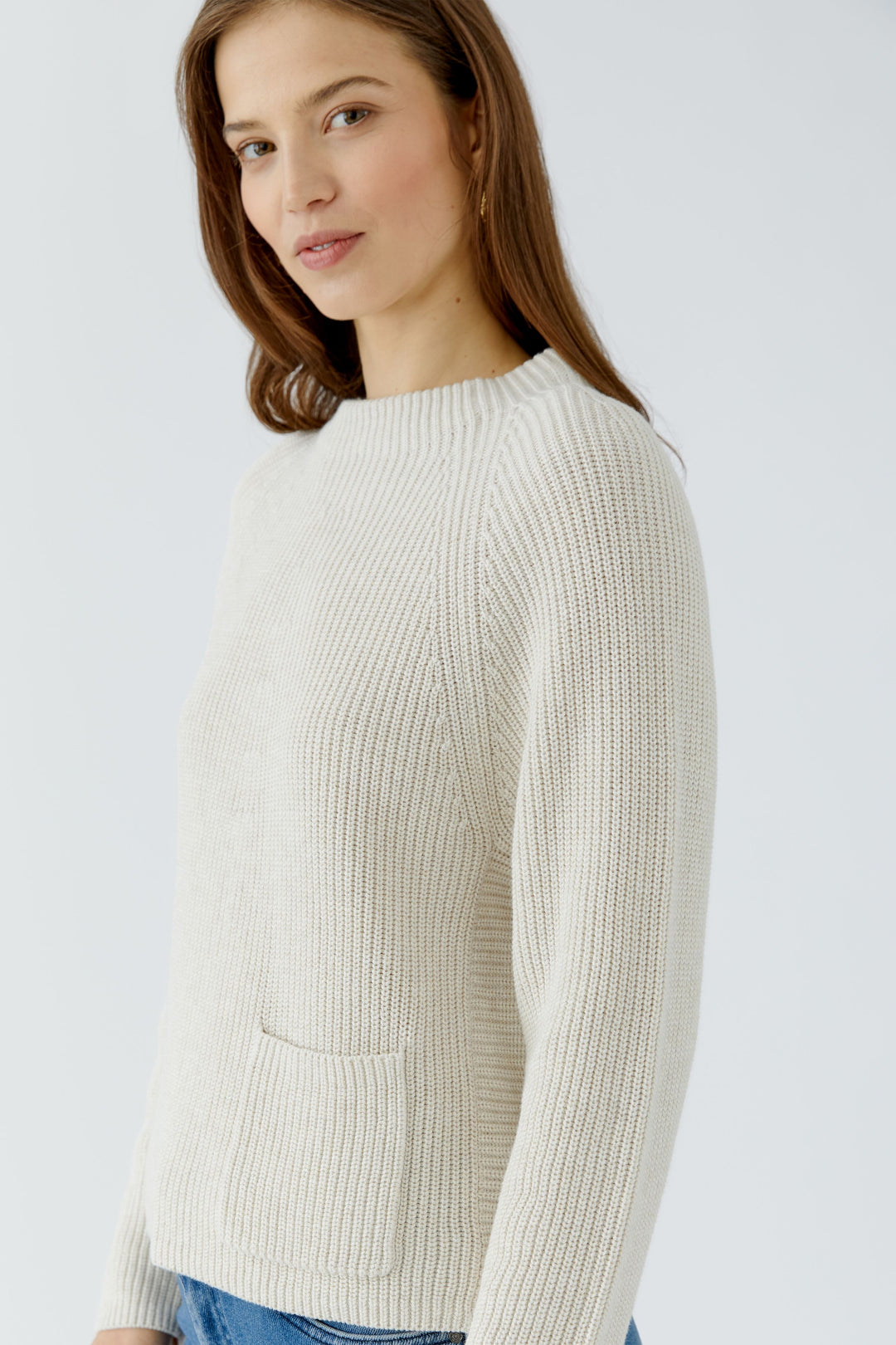 Pull texturé à poche plaquée