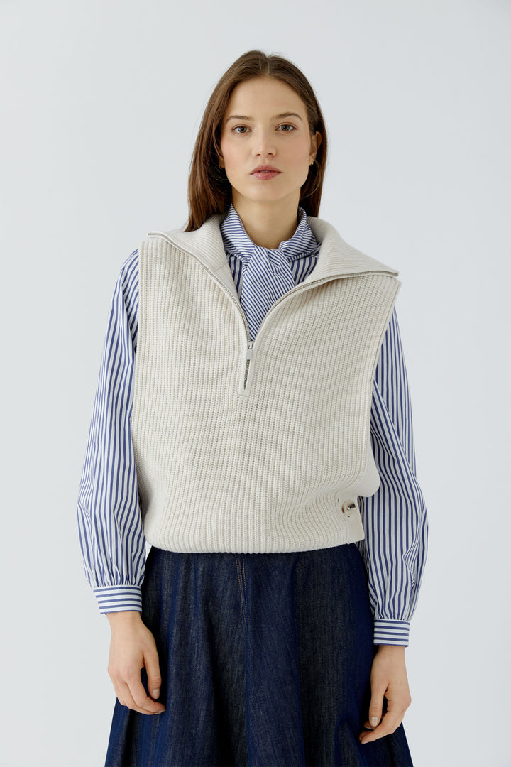 Pull sans manches à col demi-zippé
