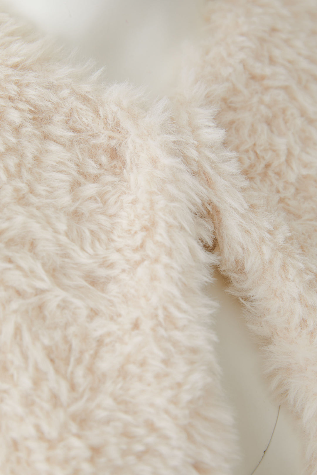 Veste courte sans manches à texture pelucheuse