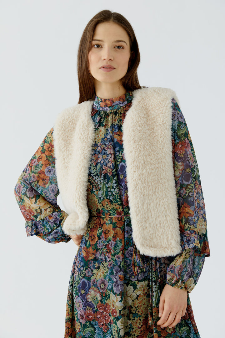 Veste courte sans manches à texture pelucheuse