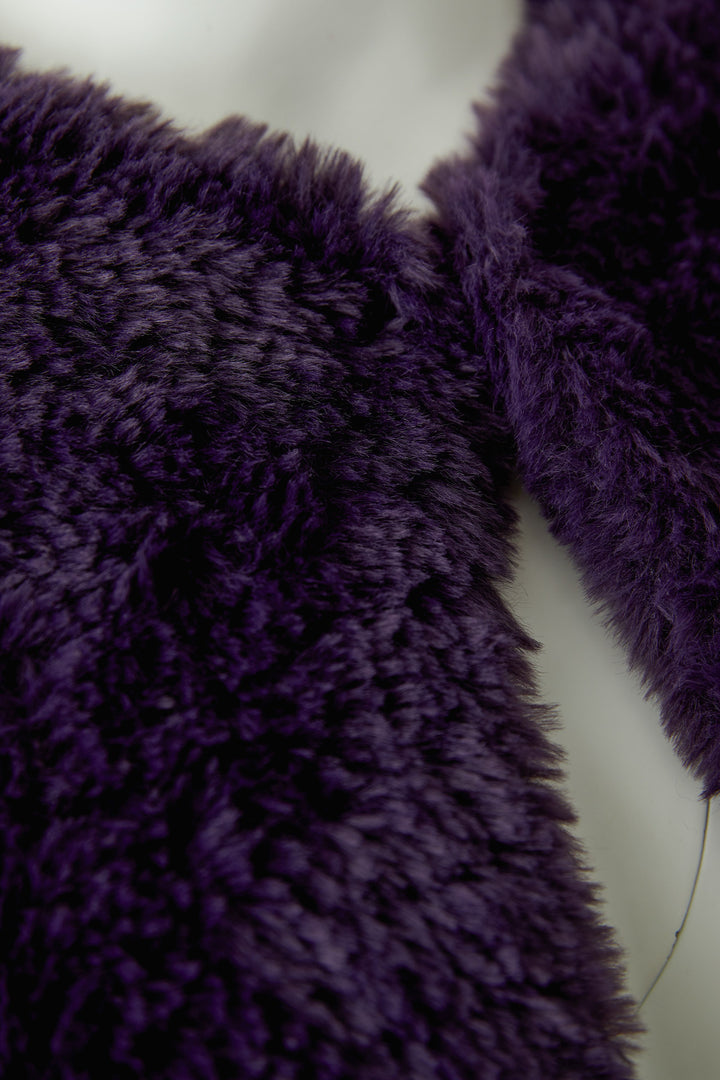 Veste courte sans manches à texture pelucheuse