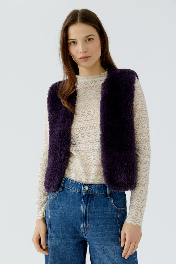 Veste courte sans manches à texture pelucheuse