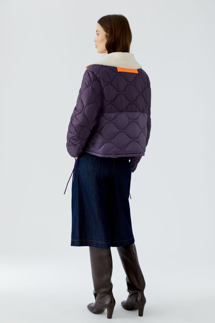 Manteau matelassé réversible à col mouton