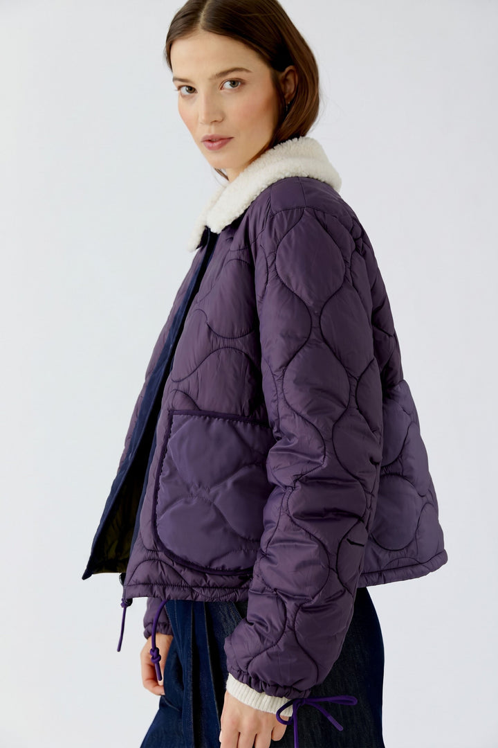 Manteau matelassé réversible à col mouton