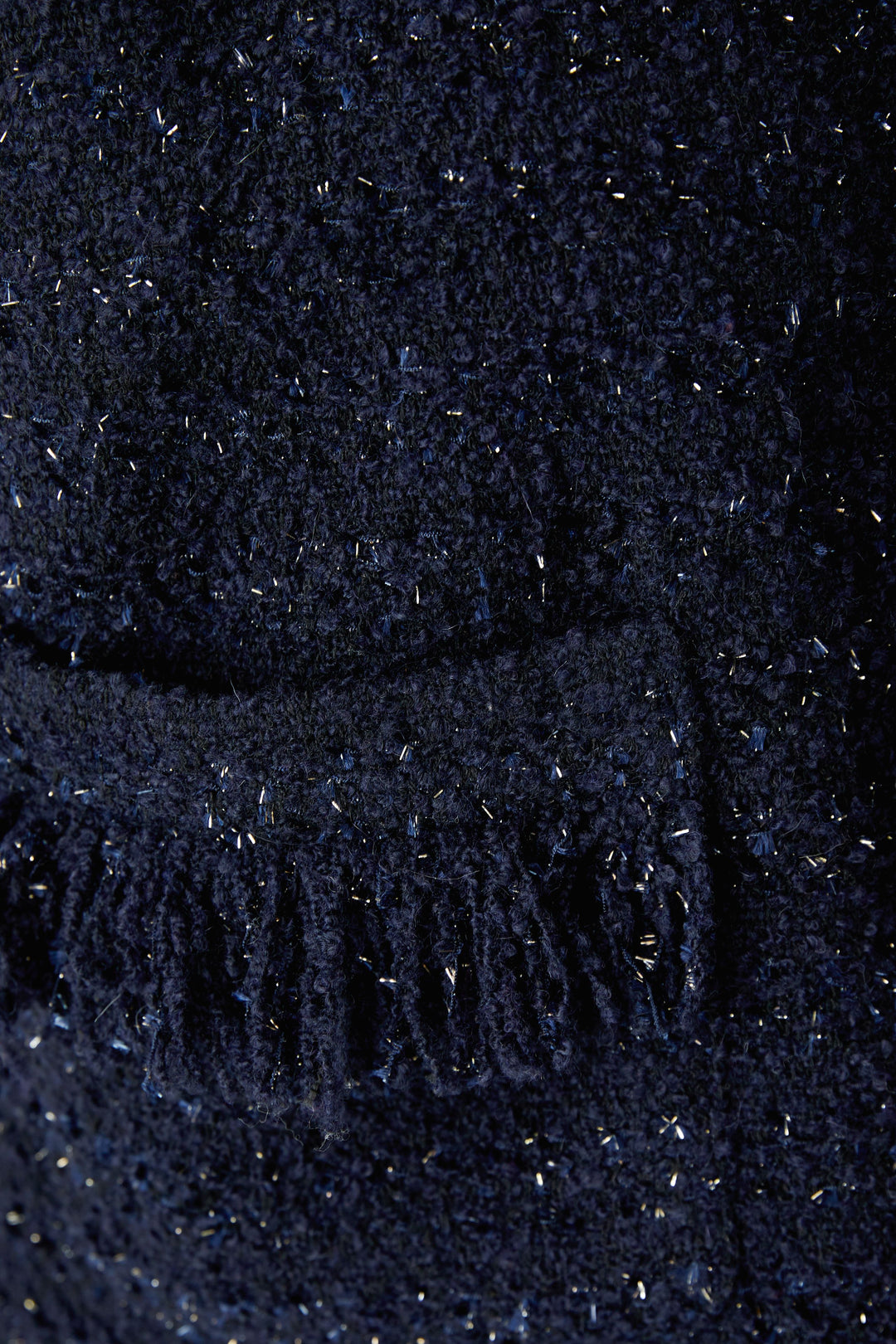 Gilet court en tweed bouclé à franges