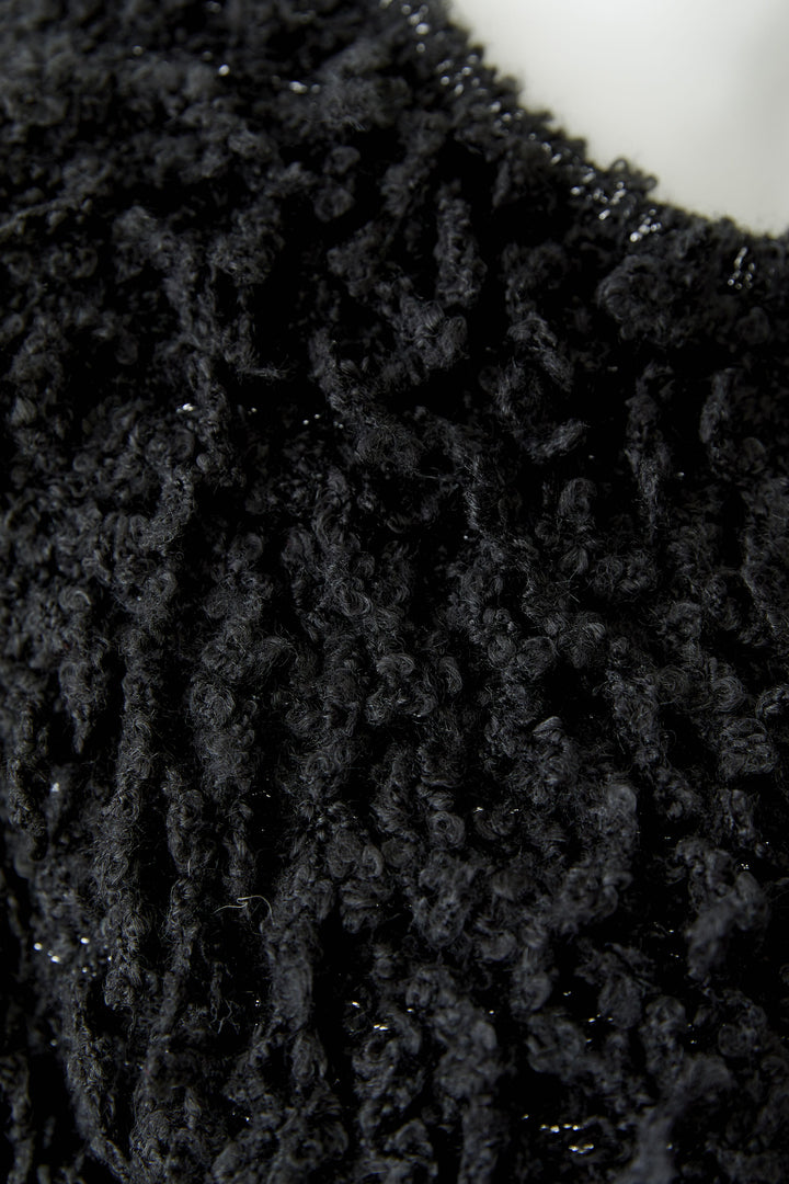 Veste courte à franges bouclées