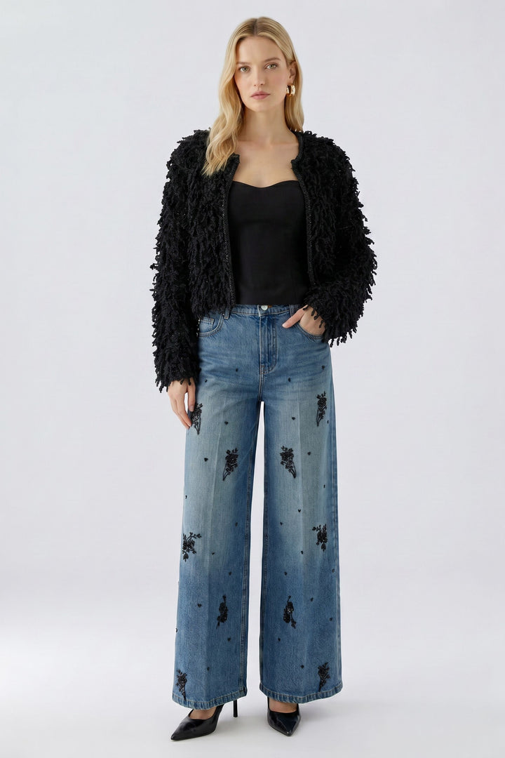 Veste courte à franges bouclées