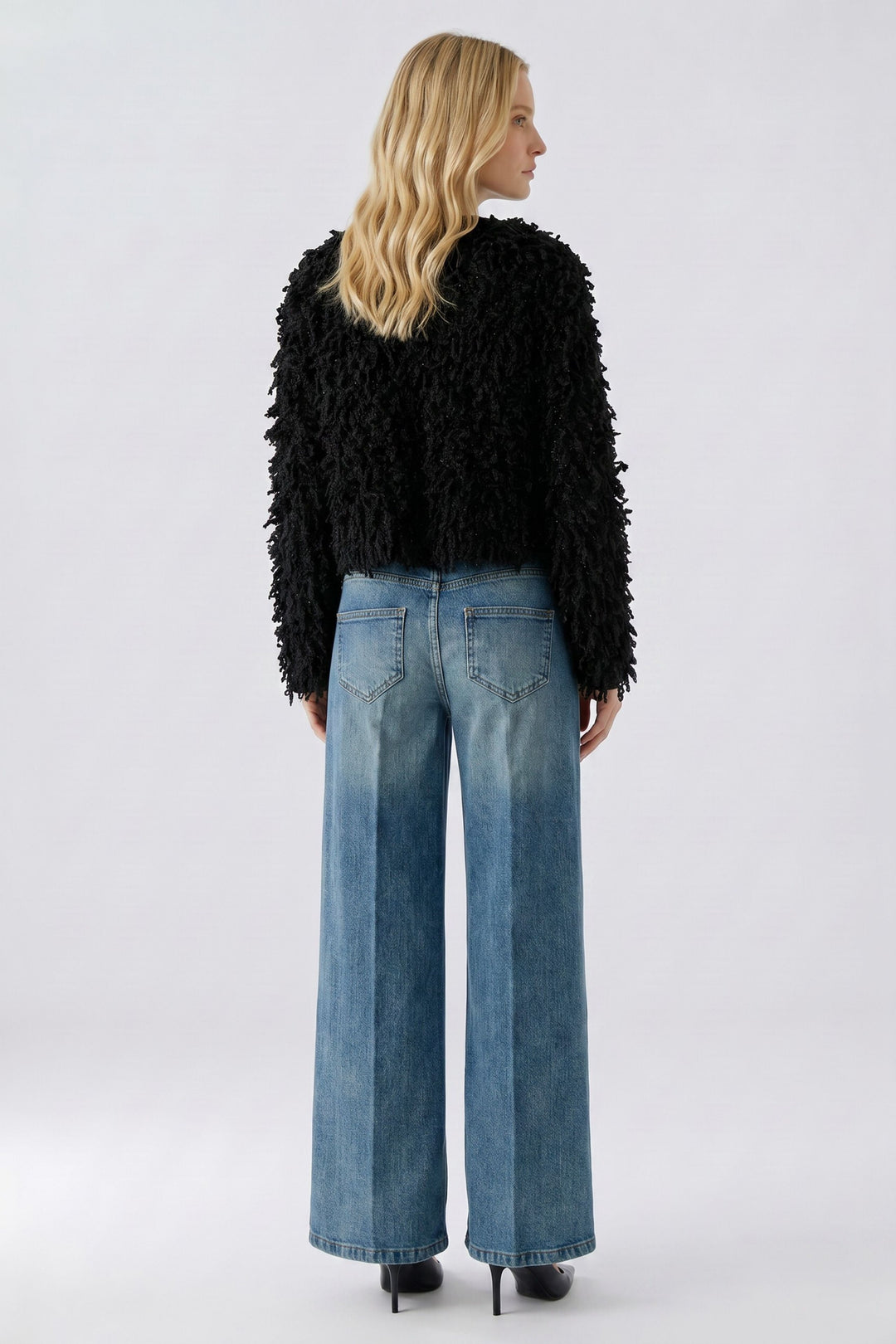 Veste courte à franges bouclées