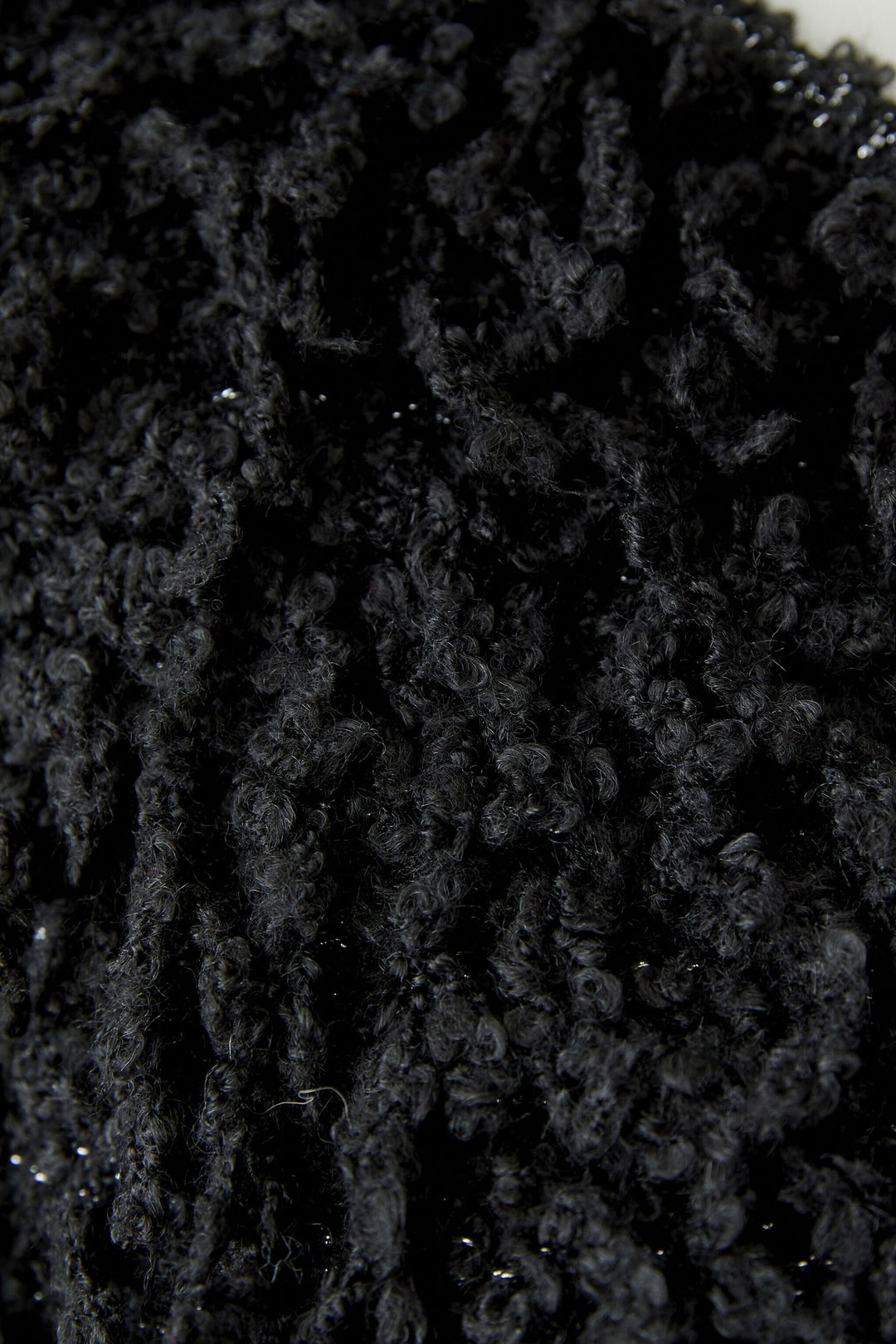 Veste courte à franges bouclées