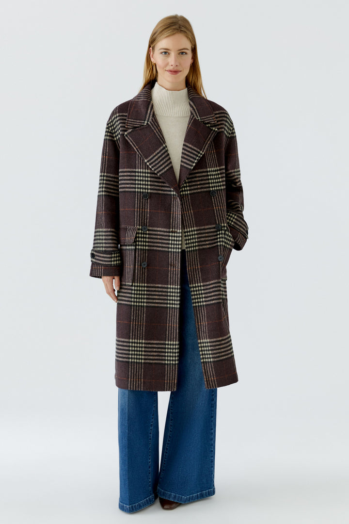 Manteau long à carreaux et boutonnage croisé