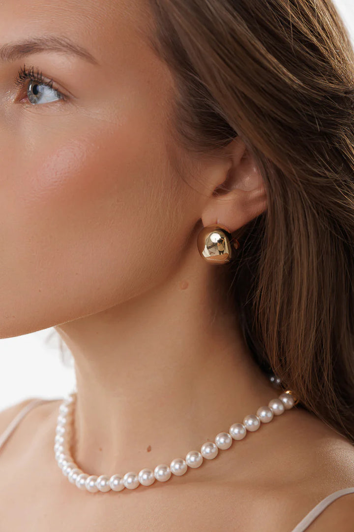 Boucles d'oreilles demi-anneaux larges
