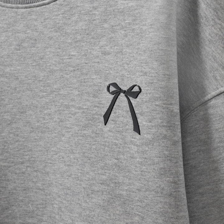 Sweat-shirt avec motif boucle et inscription Eli