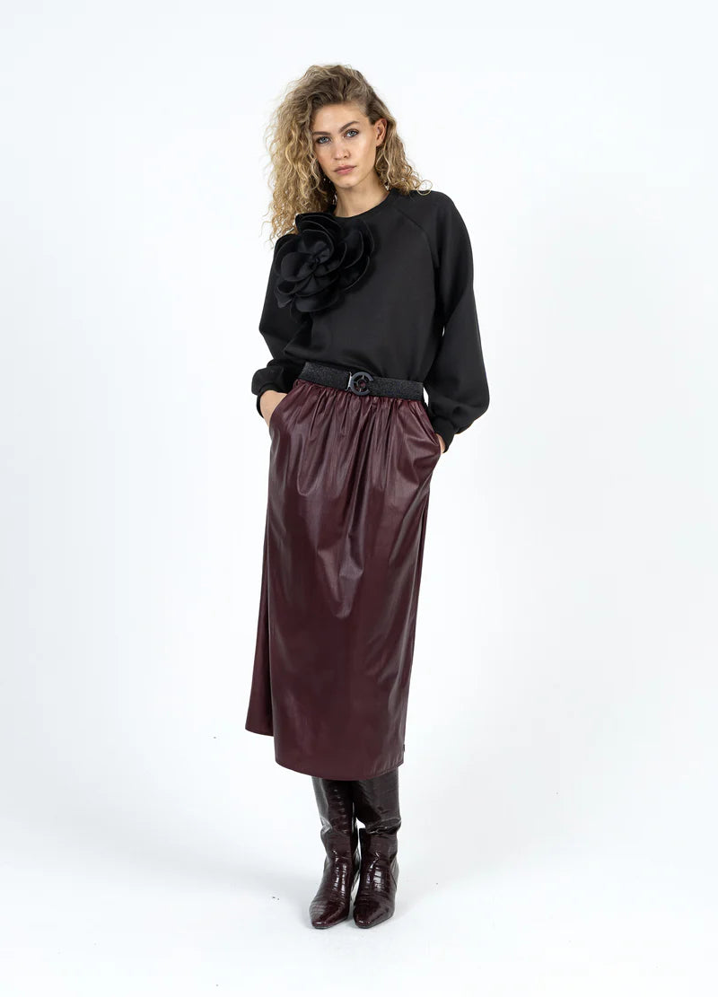 Haut manches longues avec fleur surdimensionnée