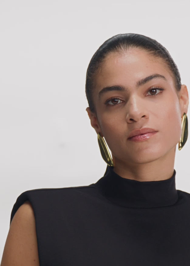 Top asymétrique à franges