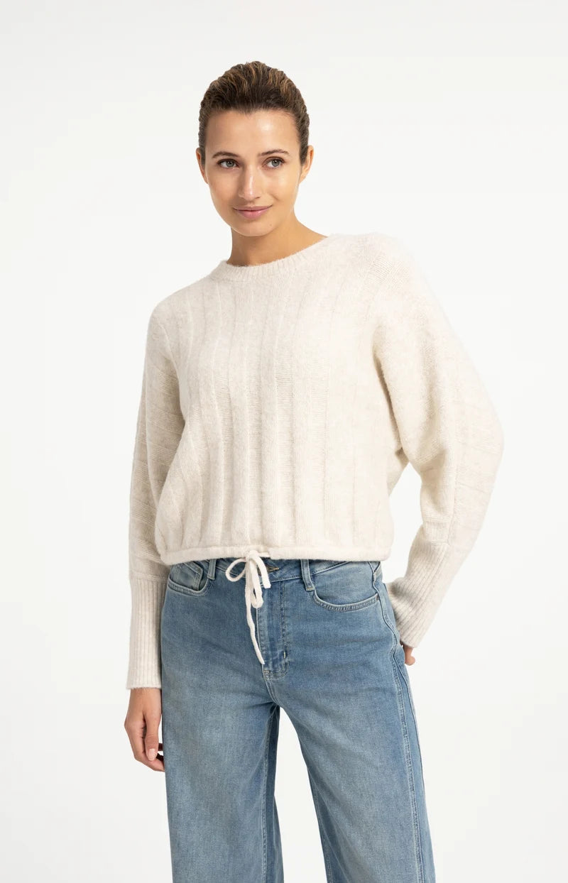 Pull ample à ourlet ajustable
