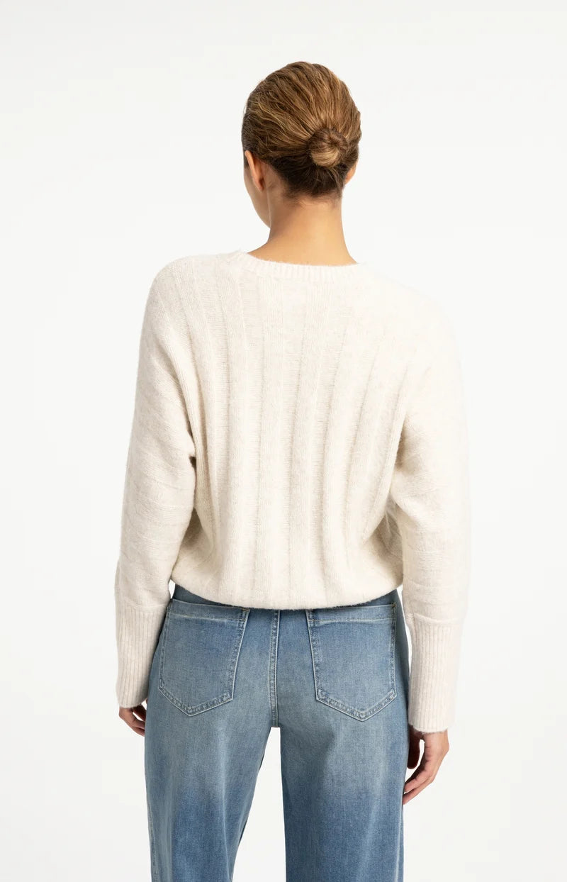 Pull ample à ourlet ajustable