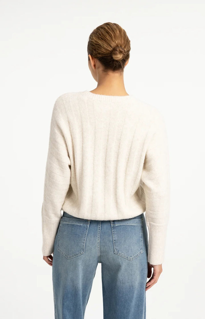 Pull ample à ourlet ajustable