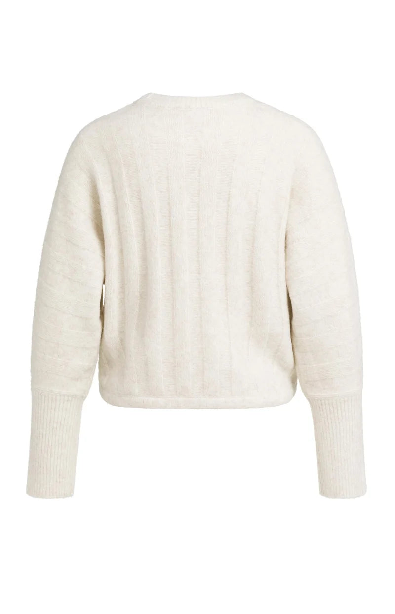 Pull ample à ourlet ajustable