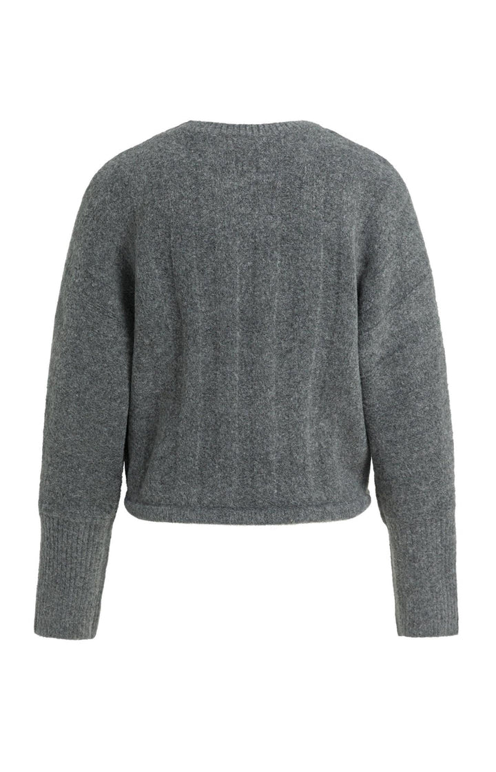 Pull ample à ourlet ajustable