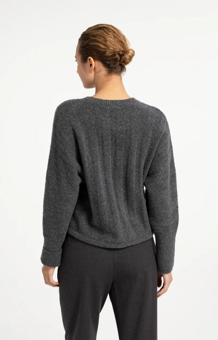 Pull ample à ourlet ajustable