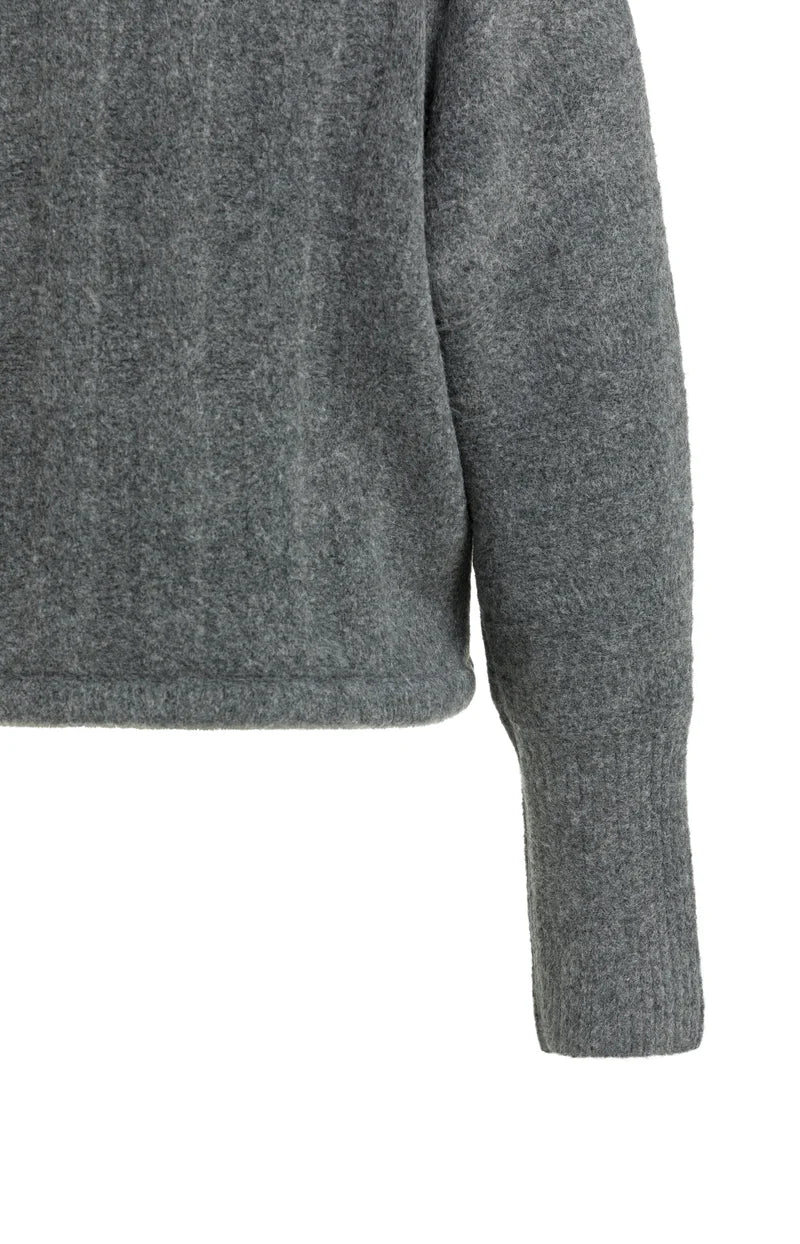 Pull ample à ourlet ajustable