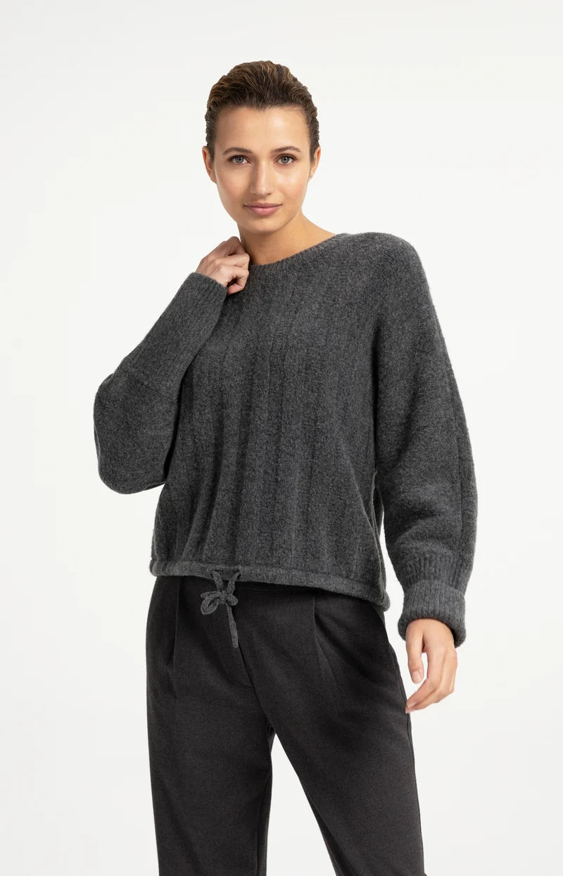 Pull ample à ourlet ajustable