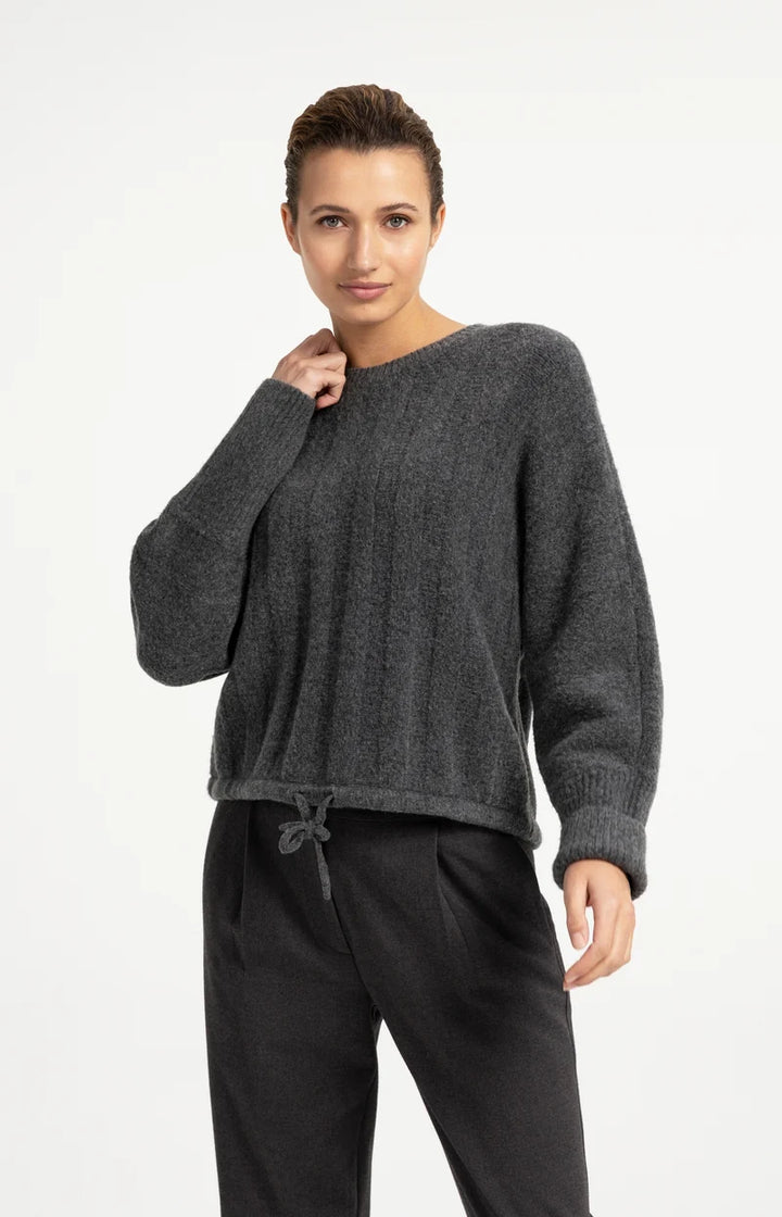 Pull ample à ourlet ajustable