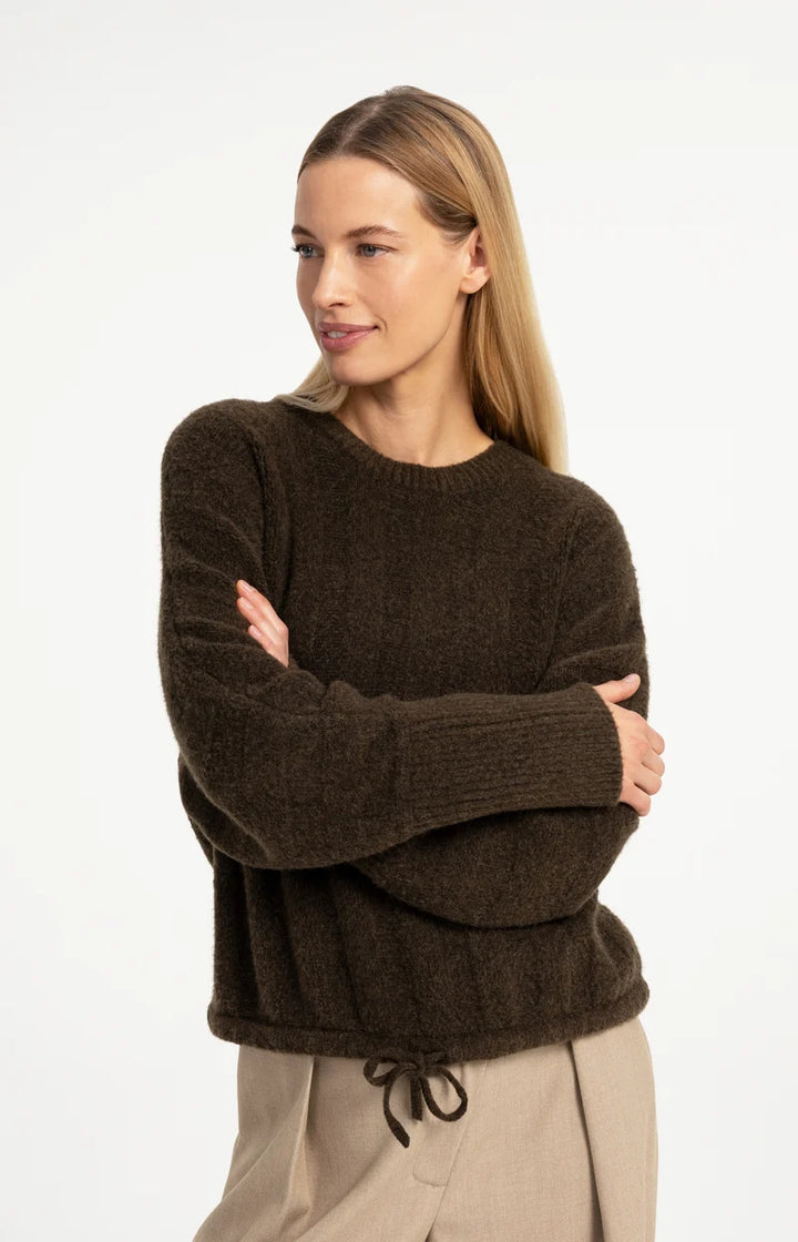Pull ample à ourlet ajustable