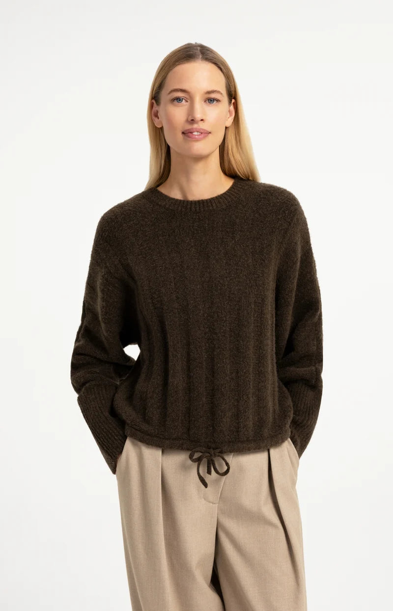 Pull ample à ourlet ajustable