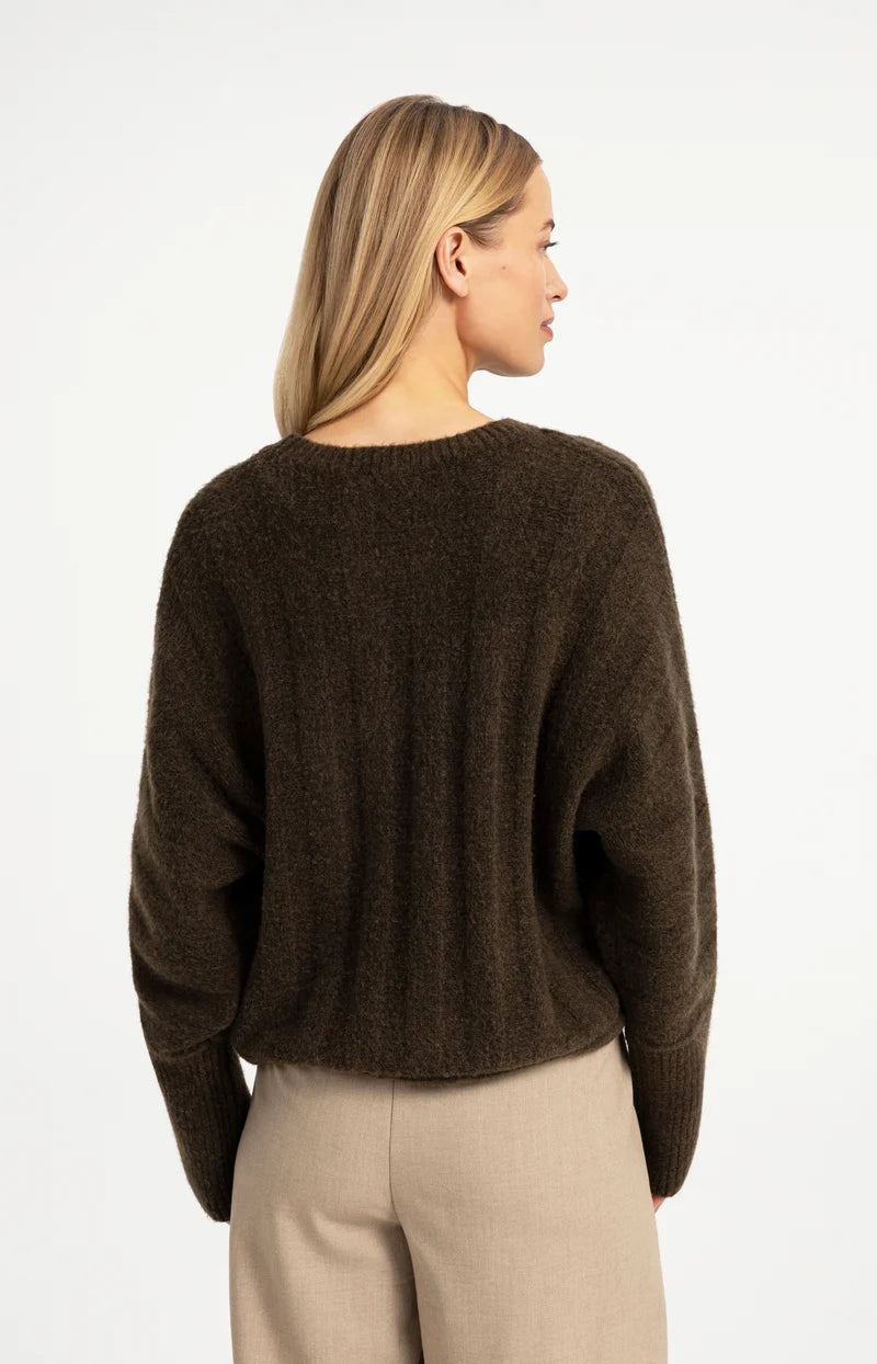 Pull ample à ourlet ajustable