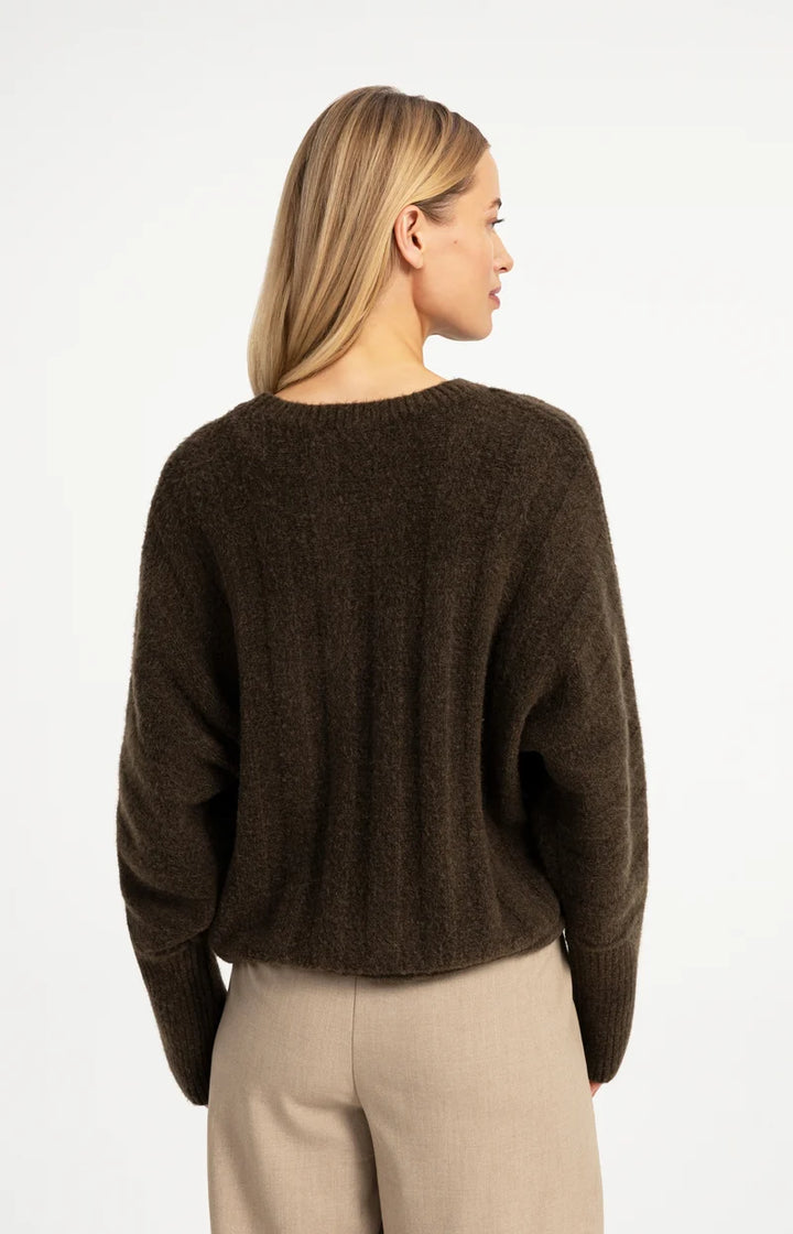 Pull ample à ourlet ajustable