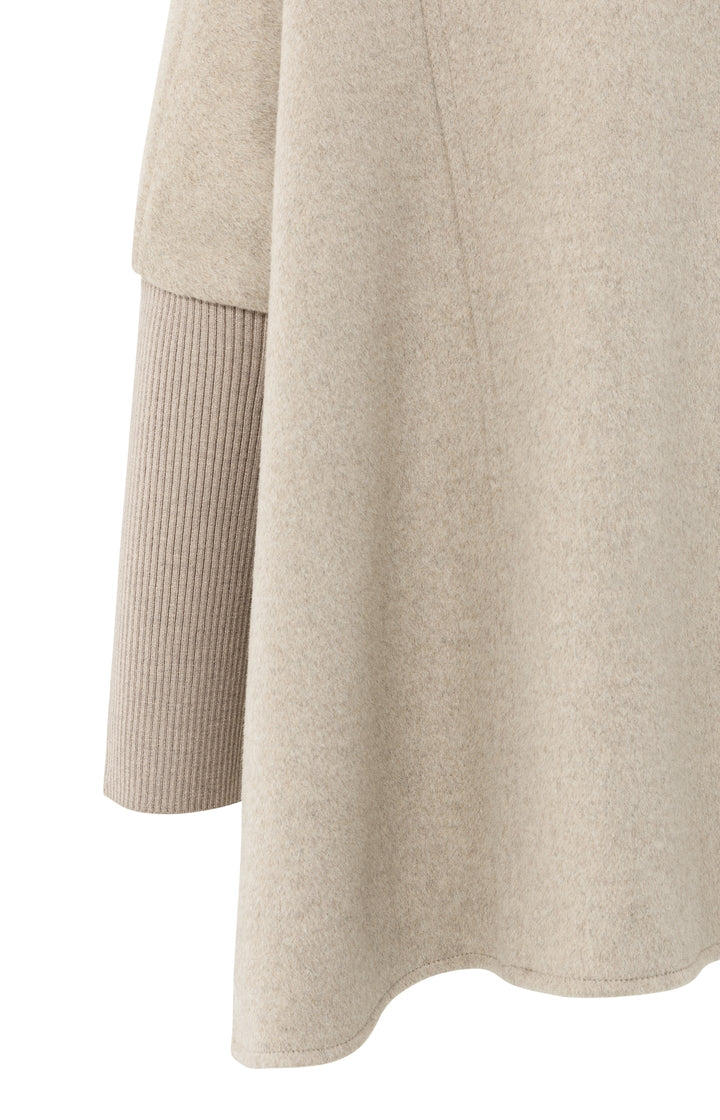Poncho avec col roulé et poche
